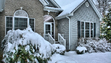 Snow covered winter home.